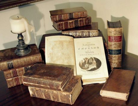 Grose antique books with candle